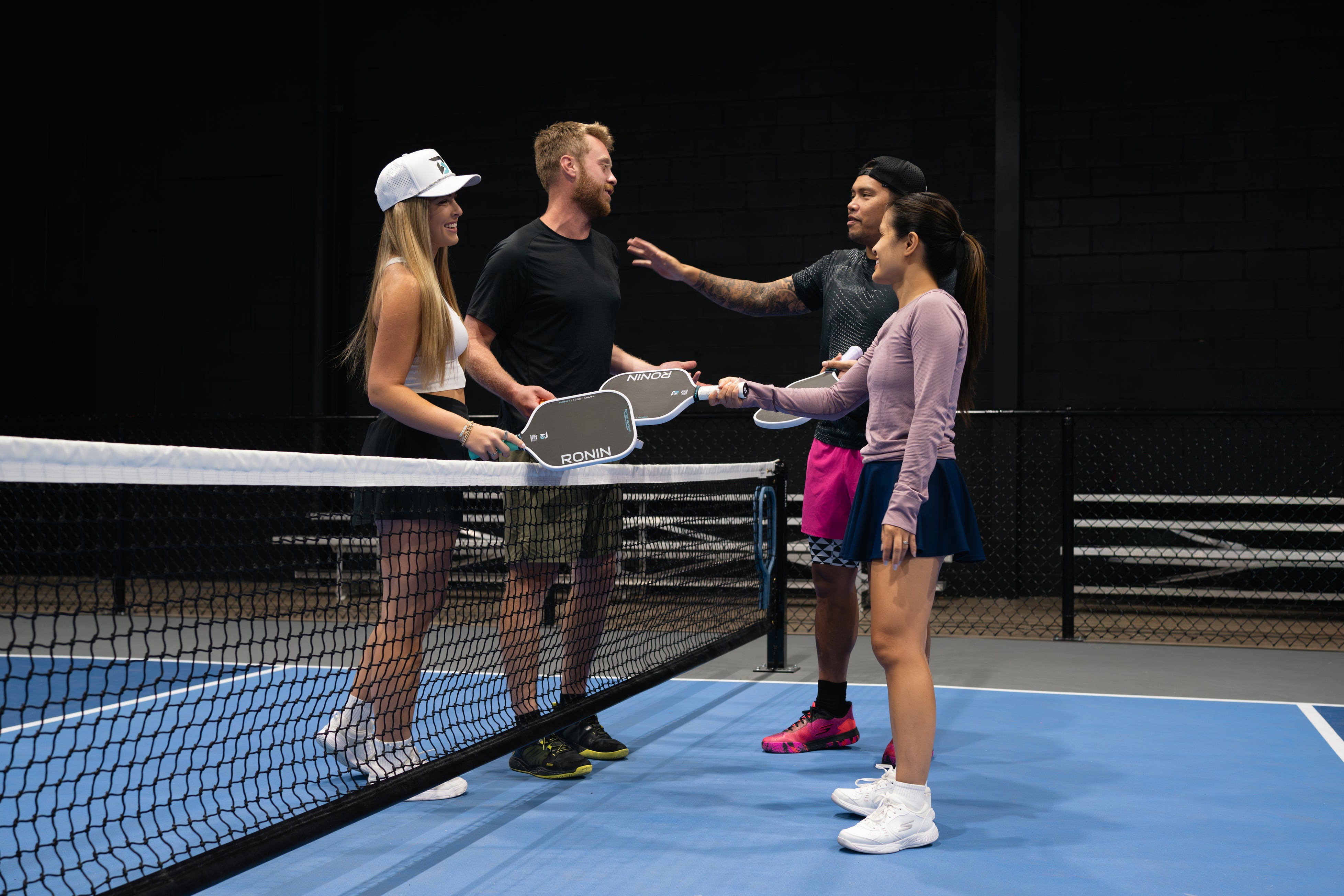 Beyond Measure players at the net